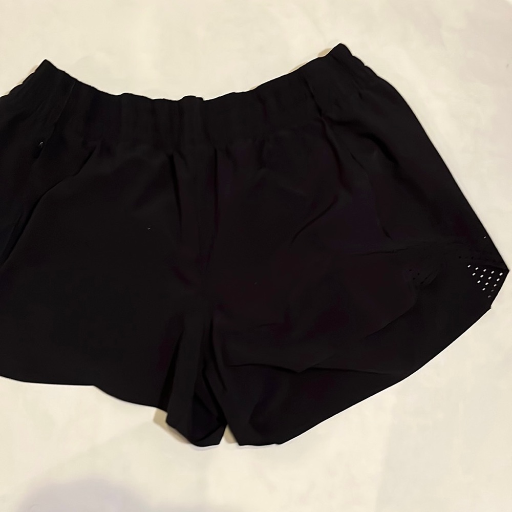 Women’s shorts Athleta size L, inseam 3’.